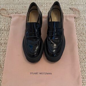 Stuart Weitzman Black Patent Leather Lug-Sole Penny Loafers